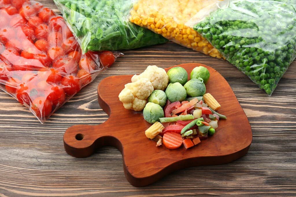 Individually quick frozen green vegetables in food grade trays